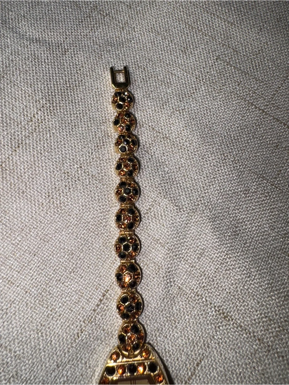 Gold-Tone Garnet Accent Womens Bracelet Watch